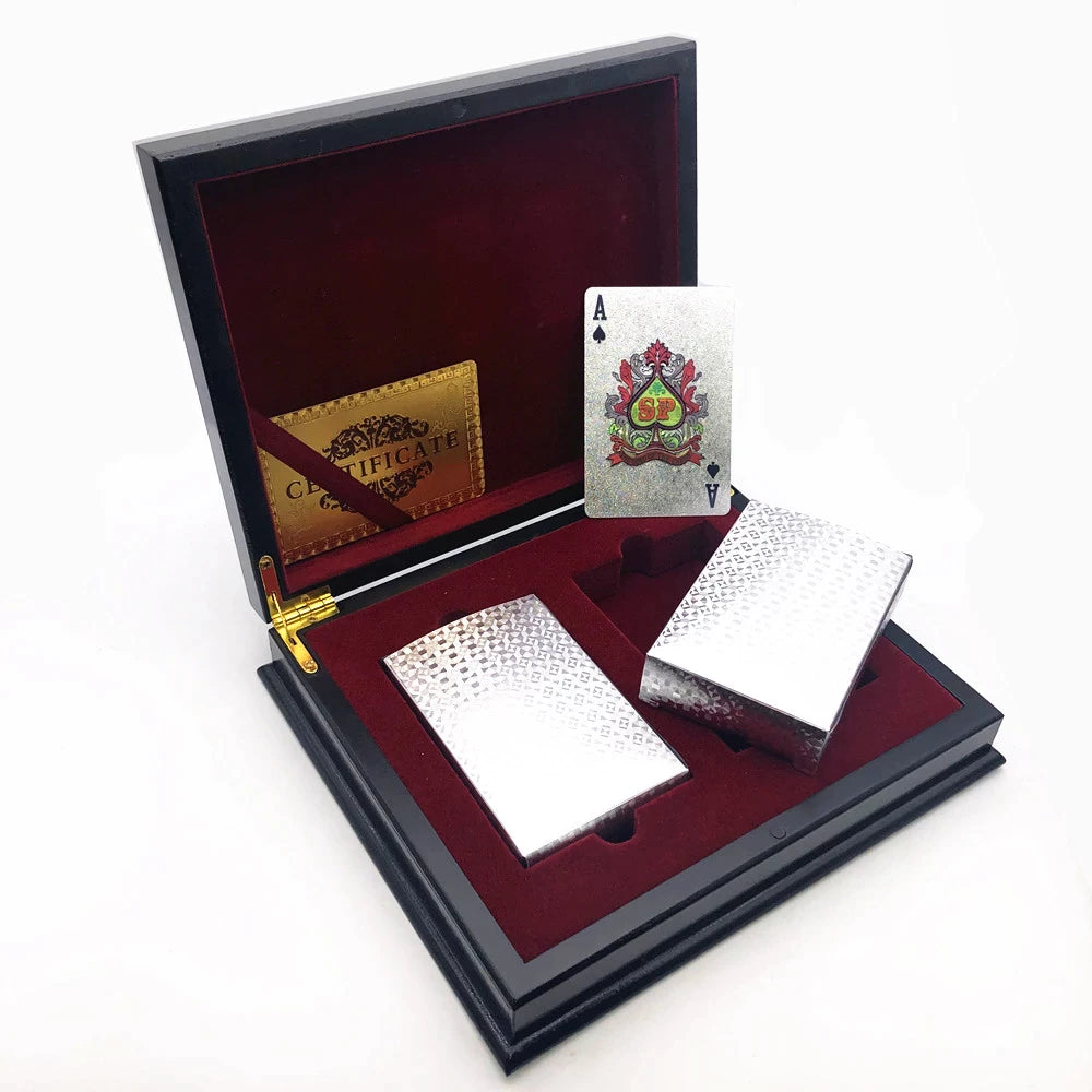 Two deck playing cards with a wooden box